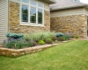 Forever Green Coralville Iowa Landscaping front planting beds small wall