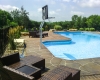 Forever Green Coralville Iowa Landscaping plantings around pool natural screen