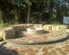 Forever Green Coralville Iowa Patios limestone fire pit seating wall