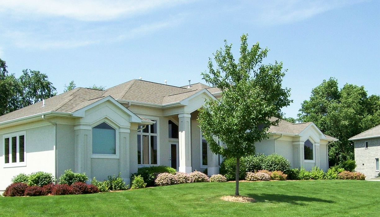 Forever Green Coralville Iowa Landscaping front of house plantings tree