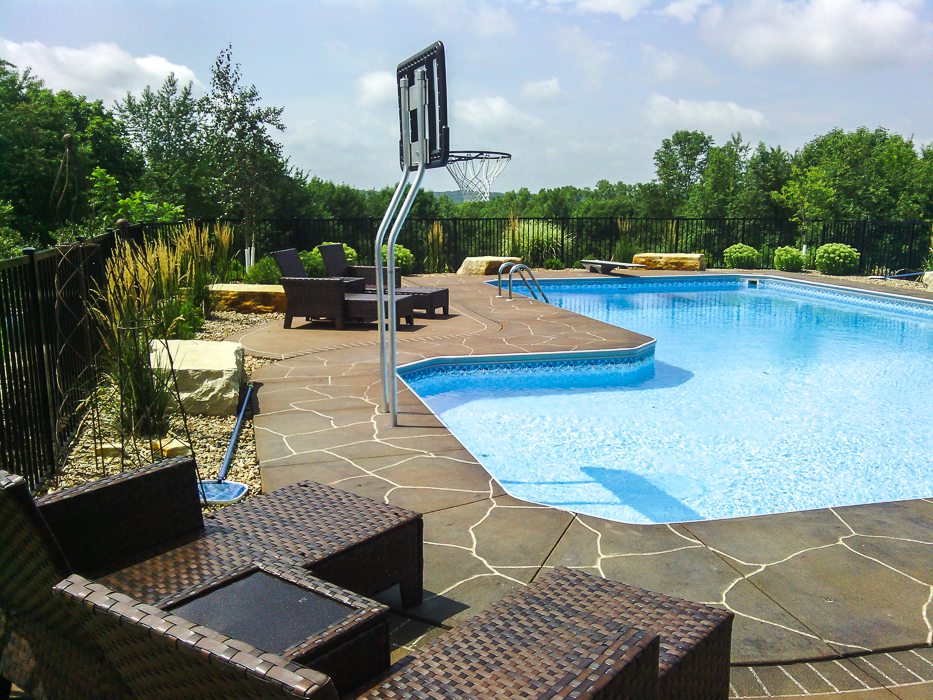 Forever Green Coralville Iowa Landscaping plantings around pool natural screen