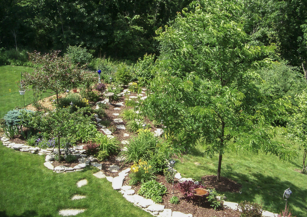Forever Green Coralville Iowa Landscaping plantings beds pathway edging