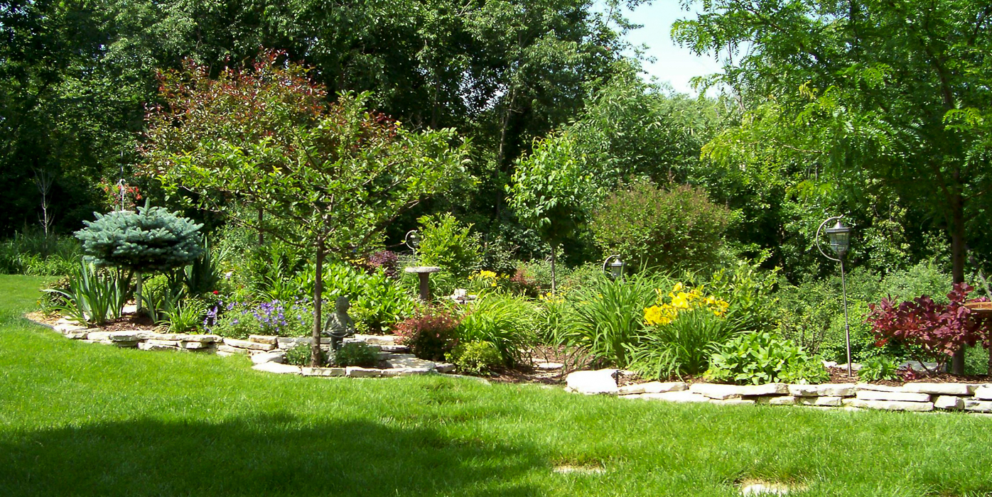 Forever Green Coralville Iowa Landscaping plantings natural limestone edging