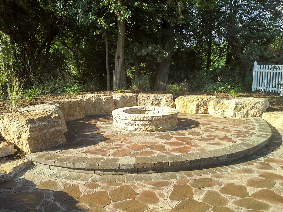 Forever Green Coralville Iowa Patios limestone fire pit seating wall
