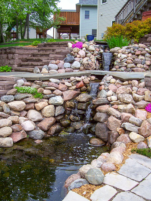 Forever Green Coralville Iowa Water Features waterfall natural pond house