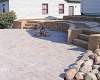 Forever Green Grows Coralville Iowa Fire Pits boulder wall retaining wall patio pathway